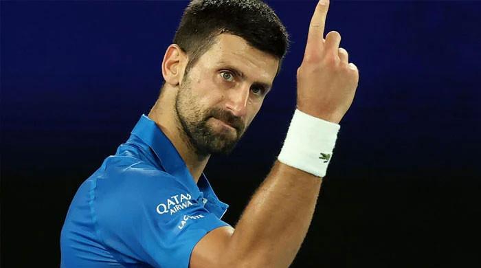 Fired-up Djokovic sends Melbourne warning, Osaka bows out injured