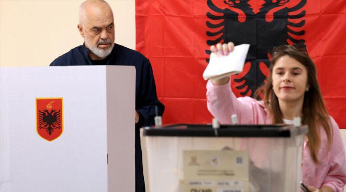 Albanians vote in elections seen as key test of EU path