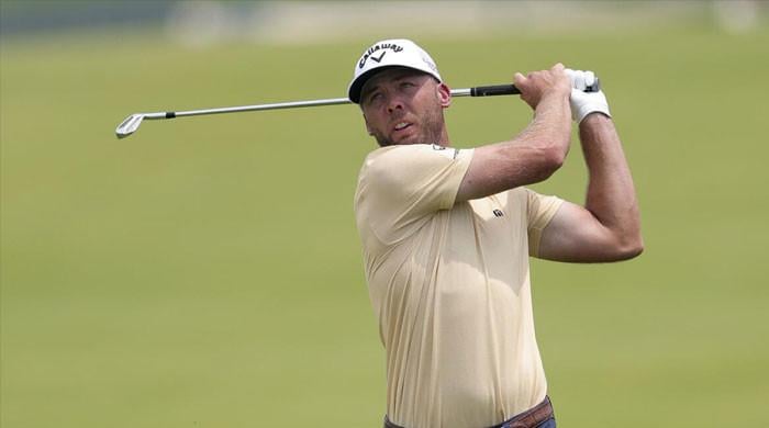 Burns fires 65 to grab US Open lead as big names stumble