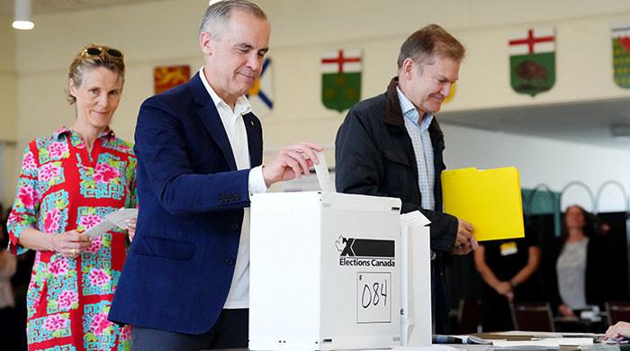 Canadians vote amid patriotism surge after campaign overshadowed by Trump