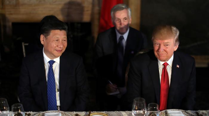 China retaliates as Trump's trade tariffs kick in 1 China retaliates as Trump's trade tariffs kick in