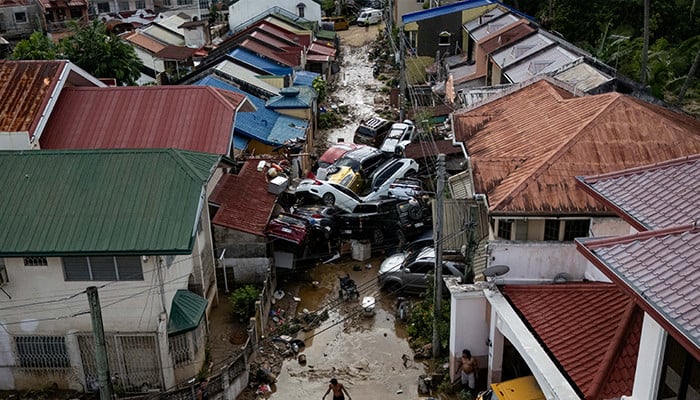 Death toll tops 100 as Philippines digs out after typhoon