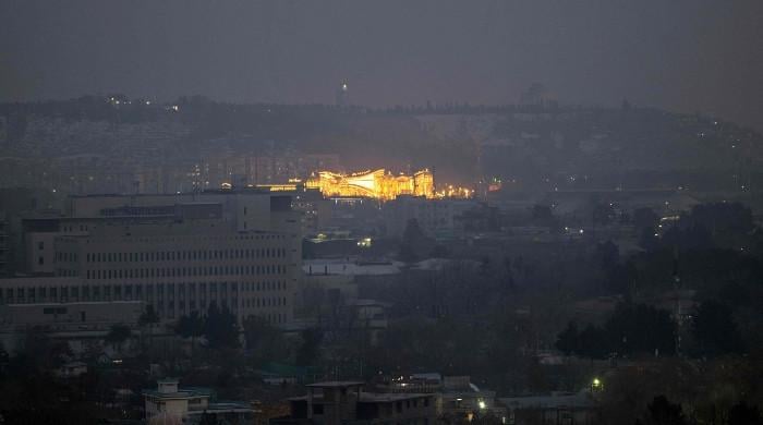 In Kabul, wedding halls bring respite from gloom