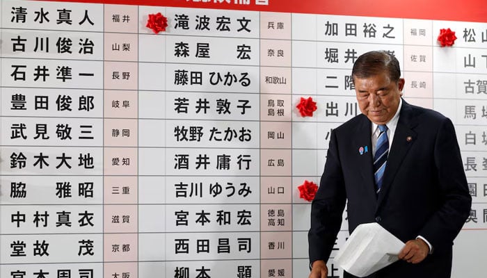Japan PM Ishiba vows to stay on after bruising election defeat 1 Japan PM Ishiba vows to stay on after bruising election defeat