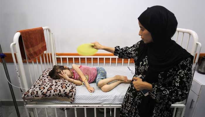 Palestinian woman raises kids alone after losing husband in Israeli airstrike 1 Palestinian woman raises kids alone after losing husband in Israeli airstrike