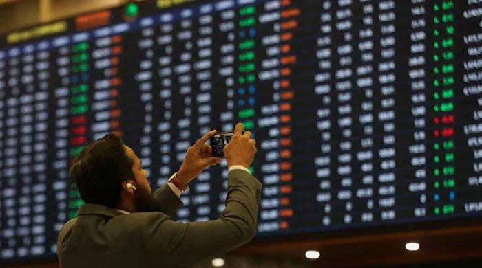 Stocks close flat amid cautious activity