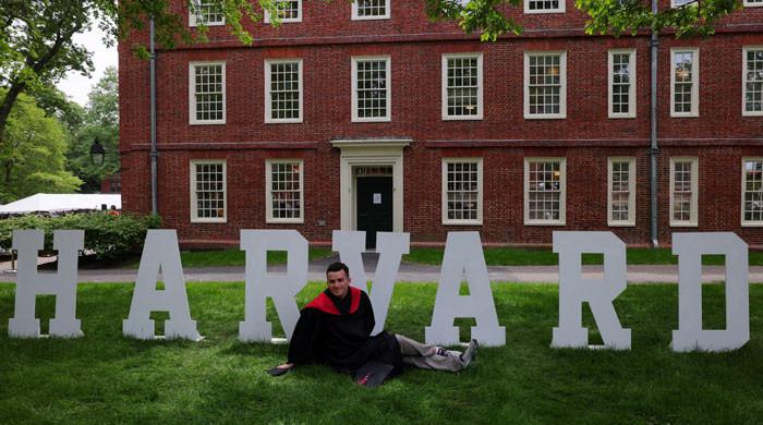 Trump administration ramps up attack on Harvard, Columbia