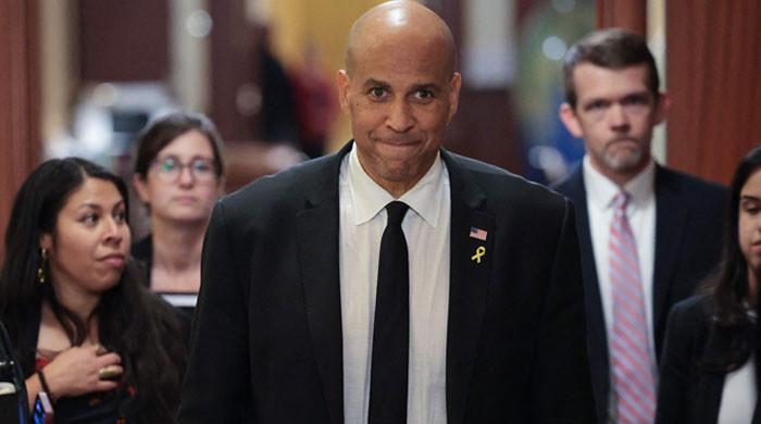 US Senator Cory Booker takes on President Trump in record-breaking speech