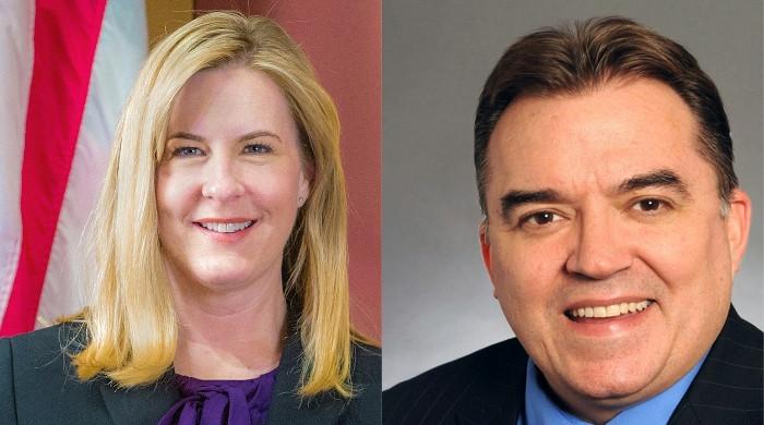US police hunt gunman after state lawmaker killed, another hurt
