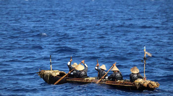 ‘Deep respect’ for Palaeolithic seafarers as researchers cross sea in dugout canoe